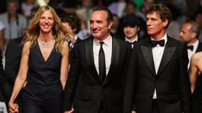 Sandrine Kiberlain, Jean Dujardin et Cédric Jimenez à Cannes le 23 mai 2022 pour présenter le film "Novembre"