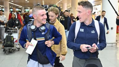 Remco Evenepoel et Serge Pauwels à l'aéroport de Bruxelles le 18 septembre 2025