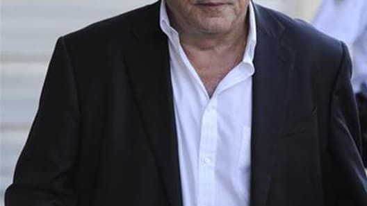 Selon Le Figaro, le parquet de Lille s'apprête à classer sans suite l'enquête préliminaire contre Dominique Strauss-Kahn pour "viol en réunion" dans l'affaire du Carlton. /Photo d'archives/REUTERS/Gonzalo Fuentes