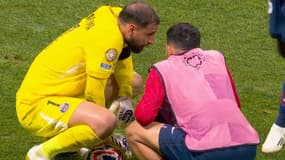 Le gardien du PSG Gianluigi Donnarumma sous le choc après son intervention sur Musiala en quart de finale de la Coupe du monde des clubs, 5 juillet 2025