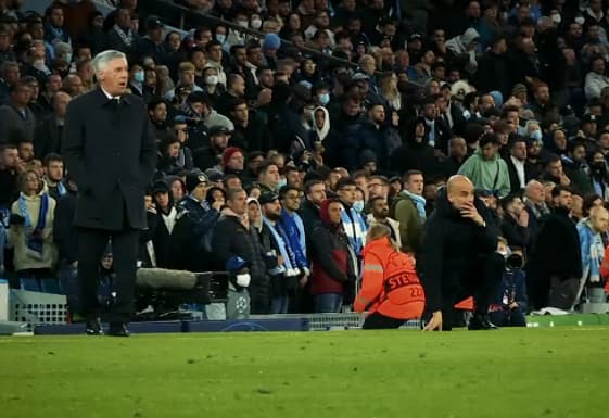 Carlo Ancelotti and Pep Guardiola during Manchester City-Real Madrid, in April 2022