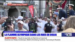 Douai: la flamme olympique sur la place d'Armes avec les géants