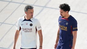 Marquinhos et Luis Enrique avant un entraînement avec le PSG en septembre 2023.