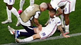 Lucas Digne au sol lors du match Portugal-France, à Budapest le 23 juin 2021