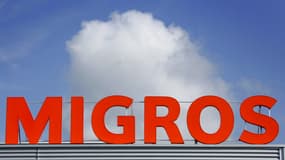 Le logo du conglomérat d'entreprises coopératives suisses de la grande distribution Migros