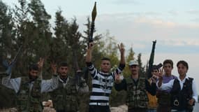 Des rebelles syriens à Minbej en 2012. 