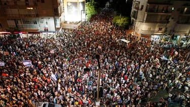 Le Premier ministre israélien Benjamin Netanyahu a annoncé dimanche la mise en place d'un comité d'experts pour examiner les réponses à apporter aux exigences des manifestants, ici à Tel Aviv, qui dénoncent depuis trois semaines la vie chère et réclament