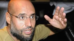 Selon le procureur de la Cour pénale internationale, Saïf al Islam, fils du dirigeant libyen défunt Mouammar Kadhafi, a indiqué à la CPI qu'il était innocent des crimes contre l'humanité dont il est soupçonné. /Photo prise le 23 août 2011/REUTERS/Paul Hac