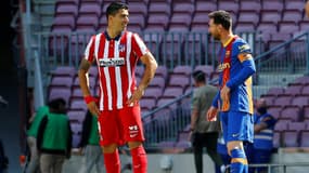 Luis Suarez avec Lionel Messi, à Barcelone le 8 mai 2021