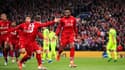 Divock Origi (à droite) célébrant le quatrième but contre Barcelone en demi-finale retour de la Ligue des champions le 7 mai 2019. 