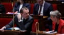 Le ministre du Travail Olivier Dussopt et la Première ministre Élisabeth Borne, le 7 mars 2023 à l'Assemblée nationale (Paris).