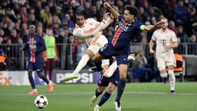 Marquinhos au duel avec Michael Olise lors de Bayern-PSG (1-0, Ligue des champions), le 26 novembre 2024