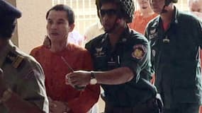 L'ancien soldat Oeuth Ang à son arrivée au tribunal de Phnom Penh, le 23 mars 2017