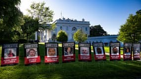 Les portraits de 100 migrants affichés sur la pelouse de la Maison Blanche, le 28 avril 2025