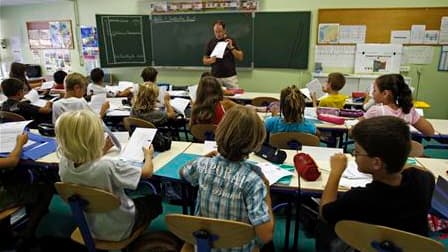 Le Parti socialiste dénonce l'idée de restaurer un examen d'entrée au collège à la fin de l'école primaire, avancée par le président du groupe UMP à l'Assemblée nationale, Jean-François Copé. /Photo d'archives/REUTERS/Jean-Paul Pélissier