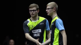 Alexis Lebrun et son frère Félix (à droite), ici à Doha, au Qatar, le 5 janvier 2024, s'affrontaient ce dimanche en finale des championnats de France de tennis de table