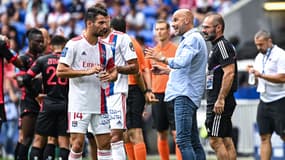Léo Dubois avec Peter Bosz, à Lyon le 22 août 2021