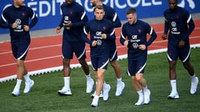 Le défenseur Théo Hernandez, les gardiens Mike Maignan et Hugo Lloris, le défenseur Luca Digne, les milieux Jordan Veretout et Aurélien Tchouaméni et l'attaquant Moussa Diaby, à l'entraînement, le 30 août 2021 à Clairefontaine-en-Yvelines