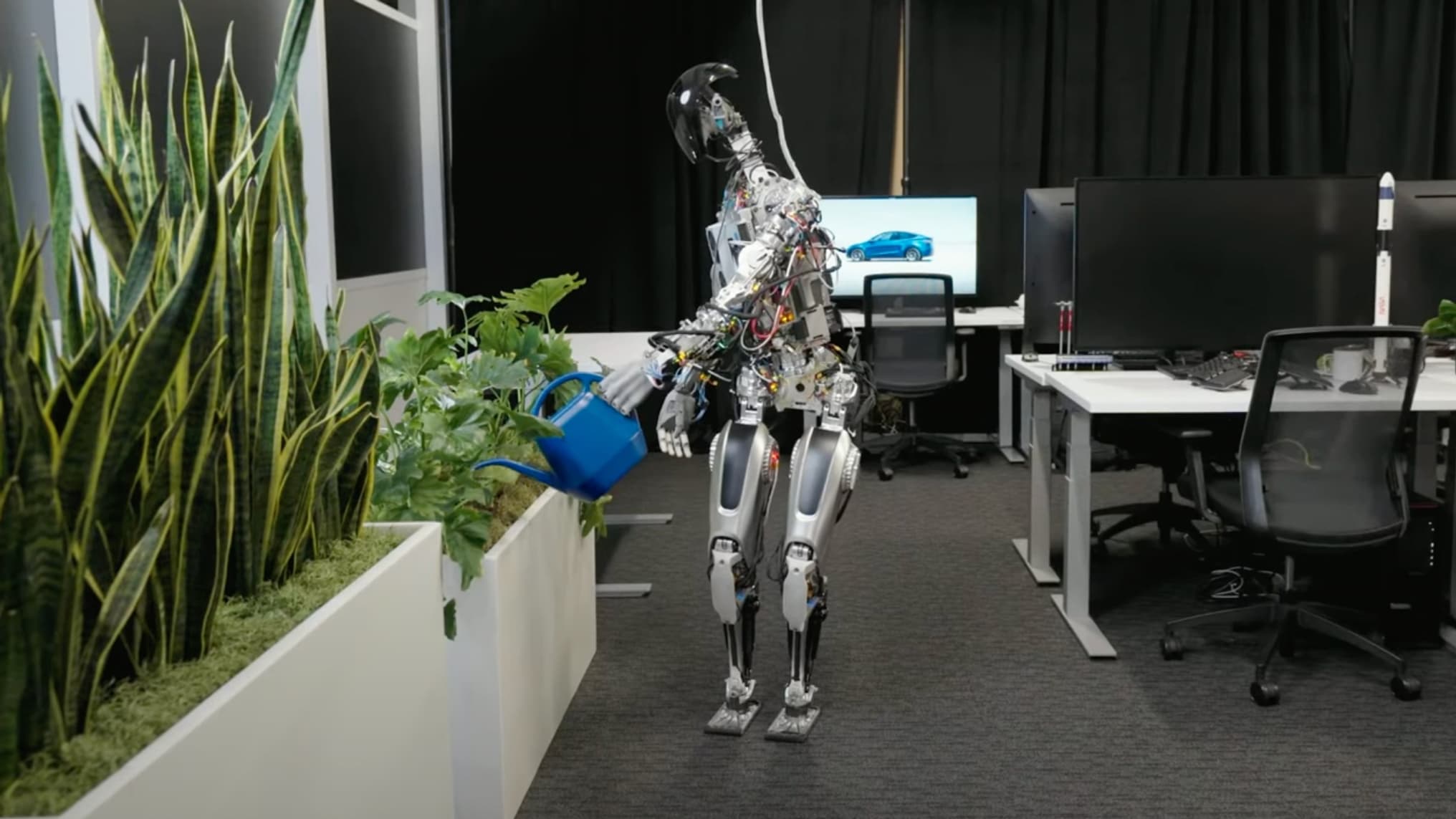 La première version du robot Optimus, de Tesla La première version du robot Optimus, de Tesla