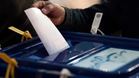 Bureau de vote à Téhéran. Les Iraniens sont appelés aux urnes vendredi pour des législatives qui pourraient donner lieu à un affrontement décisif entre les principales composantes du camp conservateur au pouvoir, sur fond de tensions exacerbées avec l'Occ