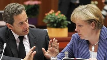 Dans une déclaration commune Nicolas Sarkozy et Angela Merkel (ici lors d'un sommet européen à Bruxelles en juin dernier) pressent l'Italie et l'Espagne d'appliquer rapidement et complètement les mesures de redressement des finances publiques décidées, af