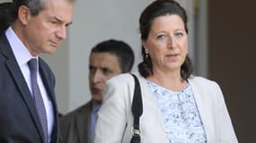 Yves Lévy et son épouse Agnès Buzyn le 18 septembre à la sortie de l'Elysée.