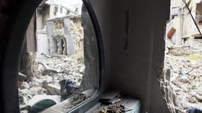 A Homs, samedi. Laurent Fabius a défendu dimanche sur France 3 la nécessité de livrer des armes à la Coalition nationale syrienne par le risque de voir les plus extrémistes, à commencer par les islamistes proches d'Al Qaïda, imposer leur loi aux opposants