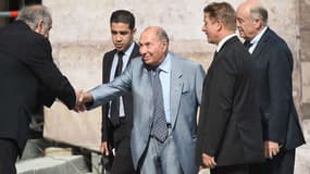 Serge Dassault, au centre, et Alain Juppé, à droite, lors des obsèques de Charles Pasqua. 