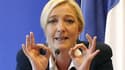Marine Le Pen rêve d'affronter Dominique Strauss-Kahn ou Nicolas Sarkozy au second tour de l'élection présidentielle de 2012, persuadée qu'elle est de pouvoir les battre en raison de leur image dans l'opinion. /Photo prise le 21 mars 2011/REUTERS/Benoît T