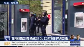 Tensions en marge du cortège à Paris: plusieurs magasins ont été vandalisés