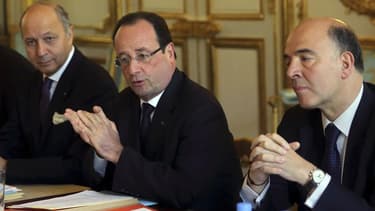 Pierre Moscovici a défendu mercredi son action comme ministre français de l'Economie, une réponse implicite aux propos de Laurent Fabius affirmant que Bercy avait "besoin d'un patron". /Photo prise le 24 avril 2013/REUTERS/Philippe Wojazer