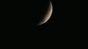 L'éclipse de lune, mercredi 8 octobre, vue de Washington DC, aux Etats-Unis.