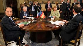 Le président français François Hollande, le président du Conseil italien Mario Monti, la chancelière allemande Angela Merkel et le chef du gouvernement espagnol Mariano Rajoy, en réunion à Rome. L'Allemagne, la France, l'Italie et l'Espagne se sont accord