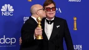 Bernie Taupin et Elton John lors de la 77e cérémonie des Golden Globes