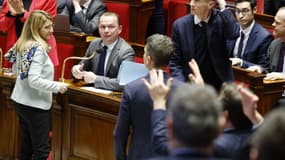 Olivier Dussopt et Frank Riester à l'Assemblée nationale le 18 février 2023 pendant les débats sur la réforme des retraites 