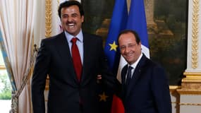 François Hollande et l'émir du Qatar, Tamim ben Hamad Al-Thani, en juin 2014, à l'Elysée. 