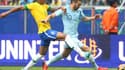 Luiz Gustavo face à Karim Benzema