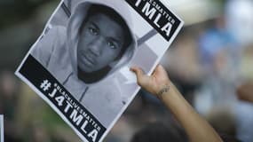 Trayvon Martin, ici sur une une affiche lors d'une manifestation en son honneur, le 17 juillet 2013 à Los Angeles. 