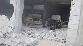 Correction: bien lire Bab Amro, et non Baba Amro. Maison endommagée dans le quartier de Bab Amro à Homs. Les bombardements de l'armée syrienne se sont poursuivis mercredi à Homs, foyer de la contestation du régime du président Bachar al Assad, et ont fait