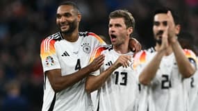 Jonathan Tah, Thomas Muller et Ilkay Gundogan après la victoire de l'Allemagne lors du match d'ouverture de l'Euro, 14 juin 2024