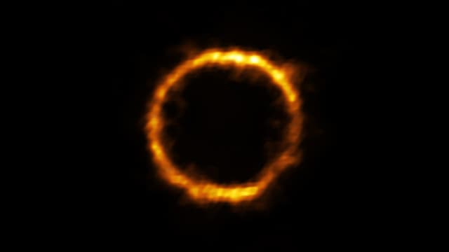 La galaxie SPT0418-47, située à 12 milliards d'années-lumière, capturée par le téléscope ALMA