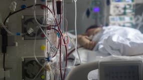 Un patient atteint du Covid-19 dans un hôpital de Wuhan, en Chine, le 19 mars 2020.
