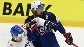 L'Italien Daniel Frank à la lutte avec le Français Damien Fleury 