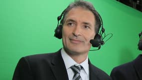 Christian Jeanpierre en train de commenter un match au Stade de France