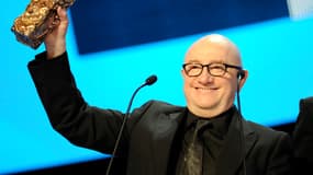 Michel Blanc en 2012, recevant son César pour le film "L'Exercice de l'Etat"