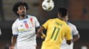 Samuel Moutoussamy face à Themba Zwane lors de la petite finale de la CAN entre la RD Congo et l'Afrique du Sud, 10 février 2024