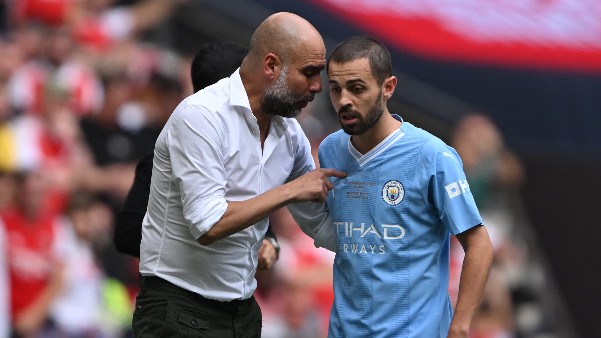 Bernardo Silva et Pep Guardiola lors du Community Shield avec Manchester City, 6 août 2023