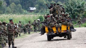 Combattants du M23 quittant Sake, à l'ouest de Goma. Les rebelles du M23 ont quitté samedi la ville de Goma, dans l'est de la République démocratique du Congo à bord de camions remplis de vivres et de munitions, conformément à un accord de retrait conclu