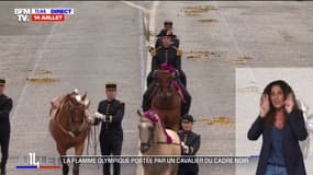14-Juillet: l'arrivée de la flamme olympique sur l'avenue Foch 