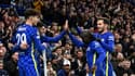 Les joueurs de Chelsea célèbrent le but de Christian Pulisic, enlacé par Kai Havertz, également buteur, contre Lille en 8e de finale de la Ligue des champions à Stamford Bridge, le 22 février 2022 